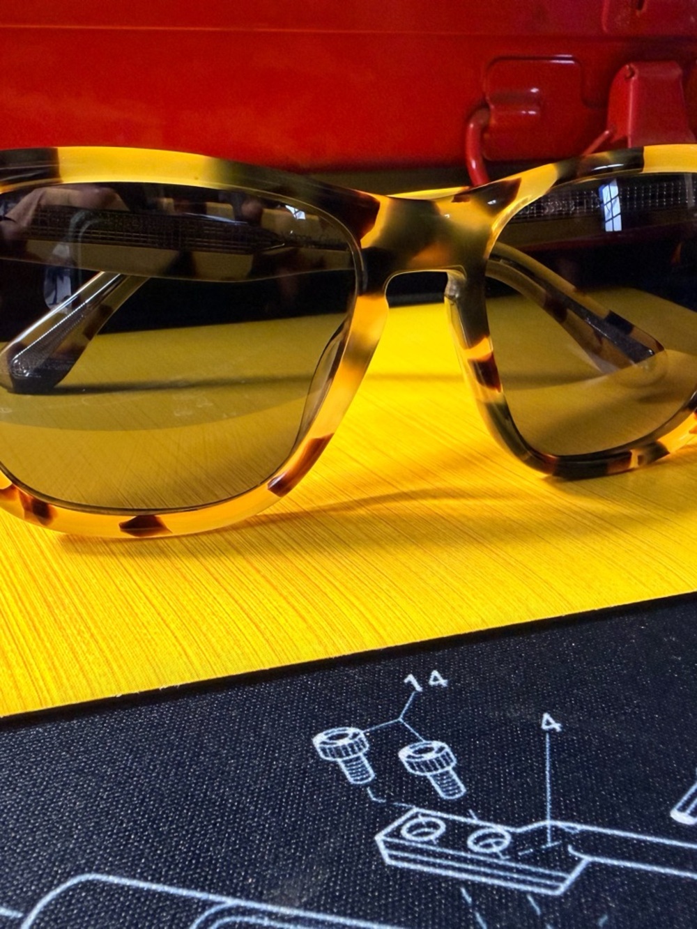 Oliver Peoples Tortoiseshell Sunglasses with Green Lenses